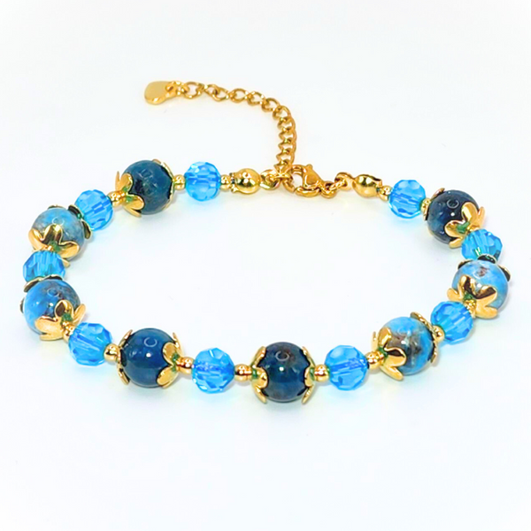 BLUE APATITE SMOOTH ROUND 8MM 18K GOLD PLATED STAINLESS STEEL BRACELET