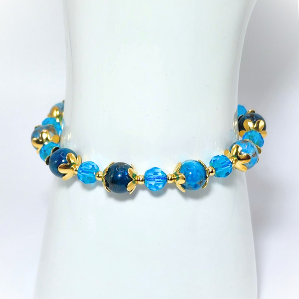 BLUE APATITE SMOOTH ROUND 8MM 18K GOLD PLATED STAINLESS STEEL BRACELET