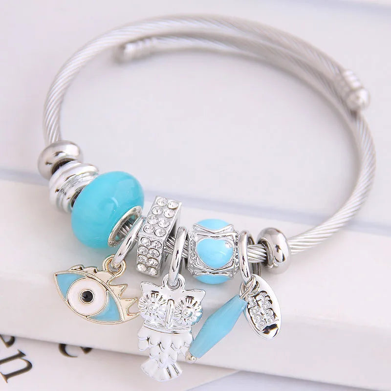 LIGHT BLUE OWL AND EVIL EYE EXPANDABLE CHARM BANGLE