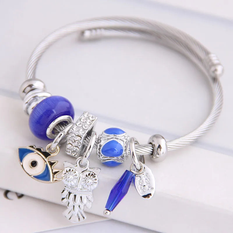 ROYAL BLUE OWL AND EVIL EYE EXPANDABLE CHARM BANGLE